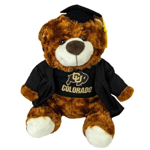A brown plushy teddy bear with a cap and gown and a C-U Buffalo t-shirt that also says "Colorado" on it.